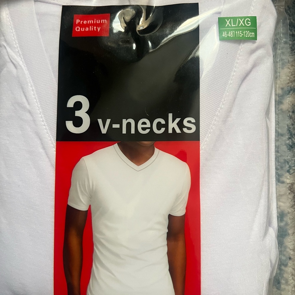 2 packs of White V-Neck T-Shirts 3 comes in a pack.